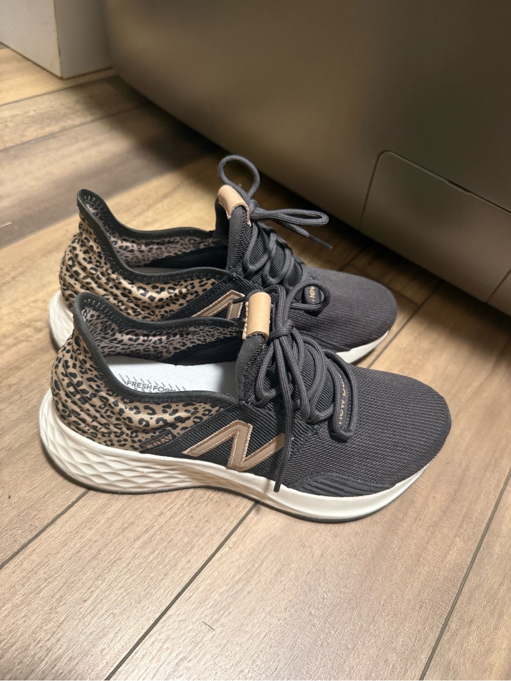 New Balance Women's Black Knit Running Shoes with Leopard Print and Tan Accents
